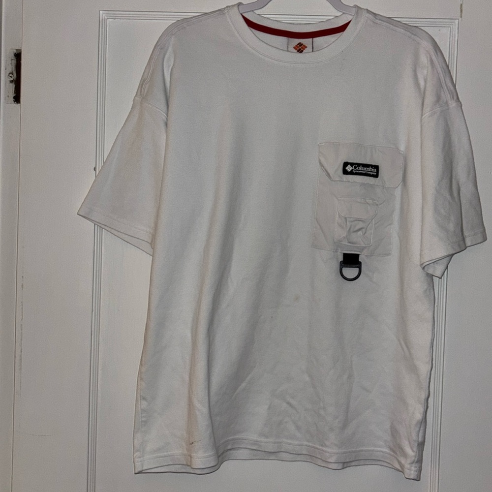 Men’s Columbia shirt 
Has small untreated stain on bottom of shirt